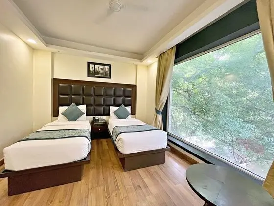 Deluxe Tek Büyük veya İki Ayrı Yataklı Oda
