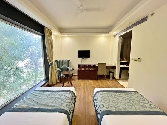 Deluxe Tek Büyük veya İki Ayrı Yataklı Oda