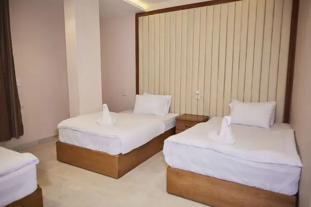 Üç Kişilik Oda