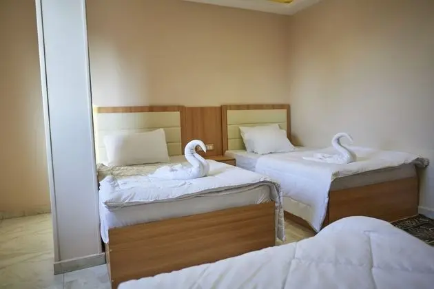 Üç Kişilik Oda