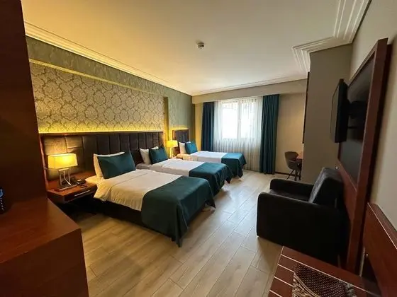 Deluxe Üç Kişilik Oda