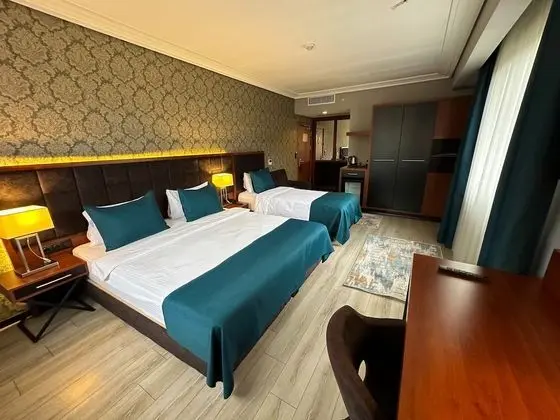 Deluxe Üç Kişilik Oda