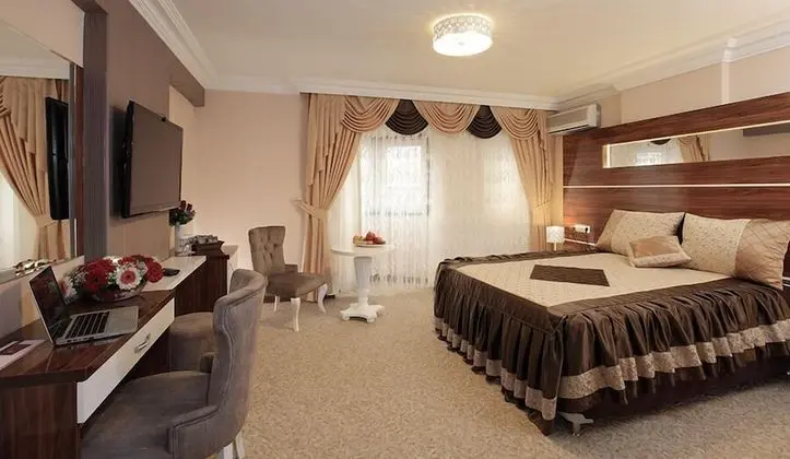 Premium Tek Büyük Yataklı Oda