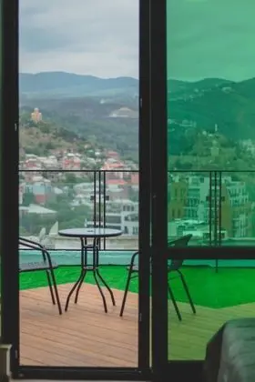Deluxe Tek Büyük veya İki Ayrı Yataklı Oda, Teras