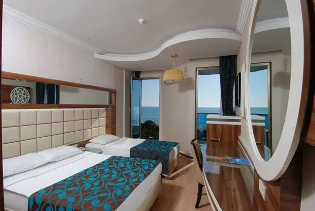 https://imagessl.etstur.com/files/images/hotelImages/TR/98252/l/Grand-Zaman-Beach-Oda-256159.jpg