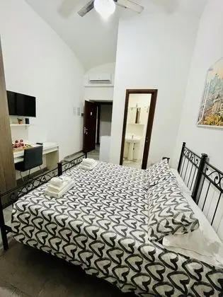 Tek Büyük veya İki Ayrı Yataklı Oda (Vittoria)