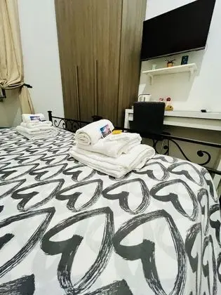 Tek Büyük veya İki Ayrı Yataklı Oda (Vittoria)