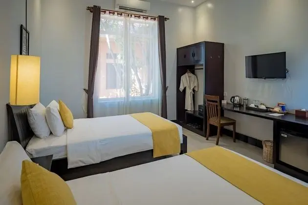 Deluxe Tek Büyük veya İki Ayrı Yataklı Oda