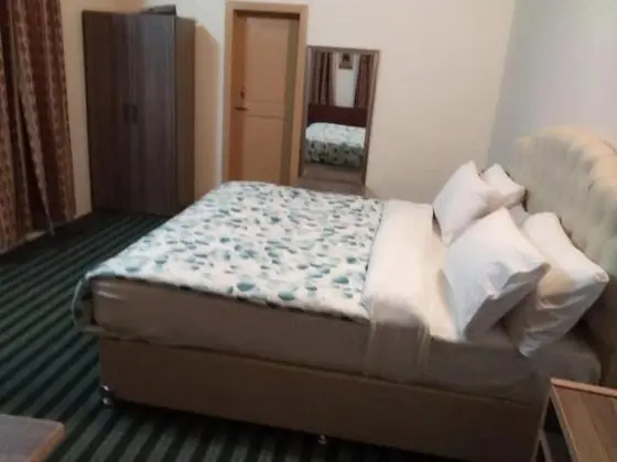 Deluxe Tek Büyük veya İki Ayrı Yataklı Oda