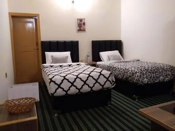 Deluxe Tek Büyük veya İki Ayrı Yataklı Oda