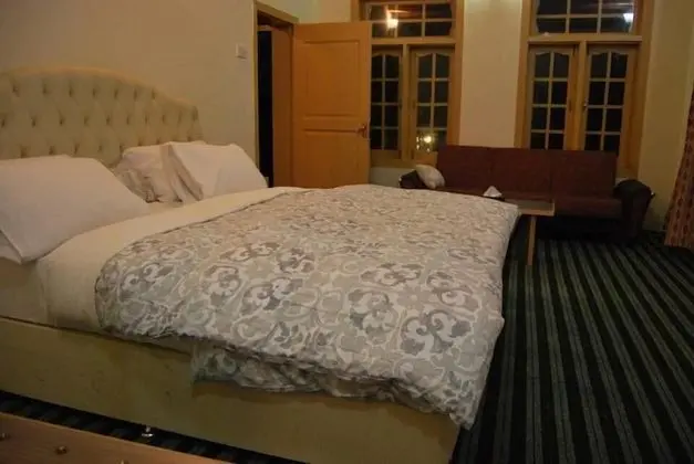 Deluxe Tek Büyük veya İki Ayrı Yataklı Oda