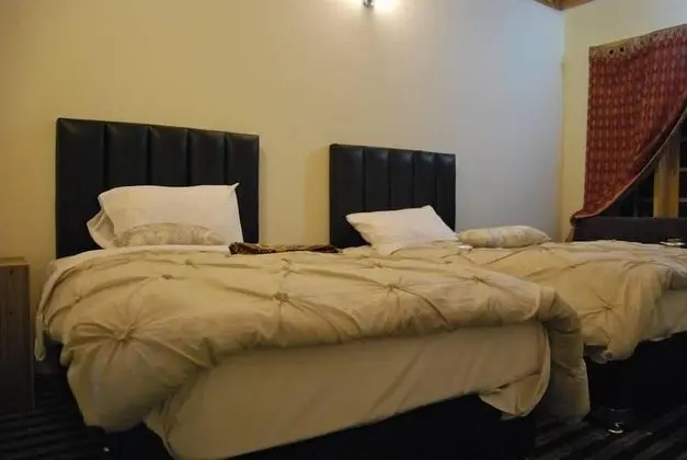 Deluxe Tek Büyük veya İki Ayrı Yataklı Oda