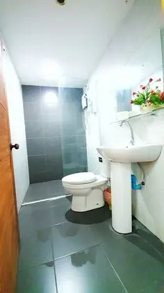 Single Bed Mixed Dormtory with Shared Bathroom