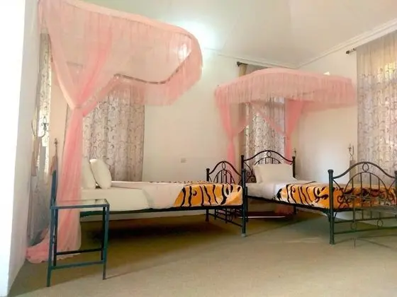 Standard Üç Kişilik Oda, Bahçe Manzaralı