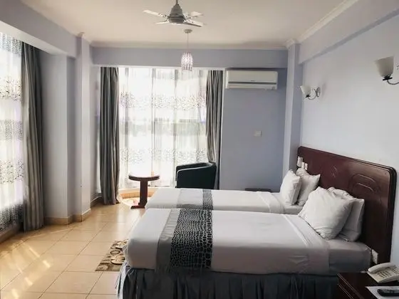 Deluxe Tek Büyük veya İki Ayrı Yataklı Oda