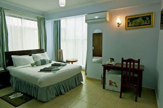 Deluxe Tek Büyük veya İki Ayrı Yataklı Oda