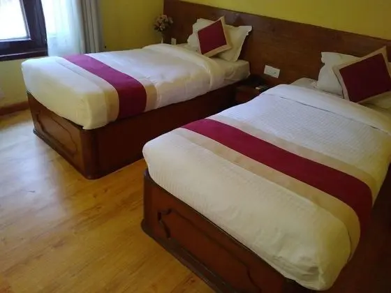 Deluxe Tek Büyük veya İki Ayrı Yataklı Oda