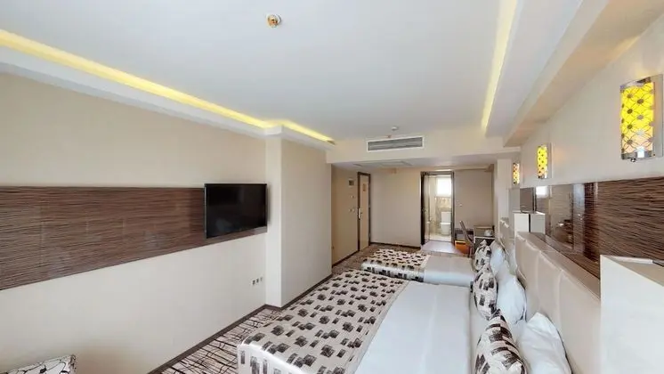 Üç Kişilik Oda