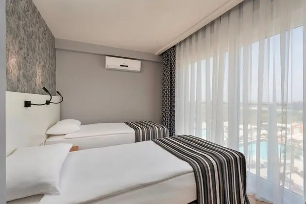 https://images.etstur.com/imgproxy/resize/2560x1440/files/images/hotelImages/etsrooms/112/Greenwood_Suites_Resort_20260317151459_3.jpg