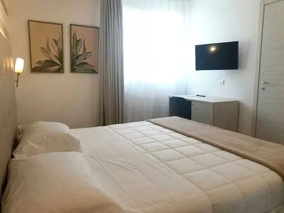 Deluxe Tek Büyük veya İki Ayrı Yataklı Oda