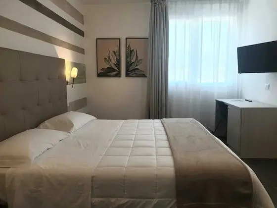 Deluxe Tek Büyük veya İki Ayrı Yataklı Oda