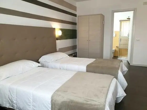 Deluxe Tek Büyük veya İki Ayrı Yataklı Oda