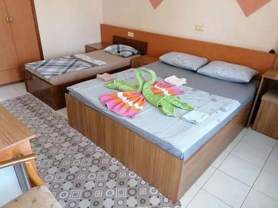 Üç Kişilik Oda