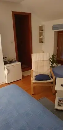 Üç Kişilik Oda