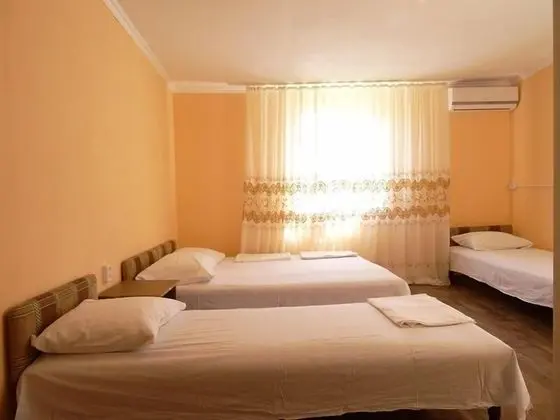 Standard Üç Kişilik Oda, Bahçe Manzaralı