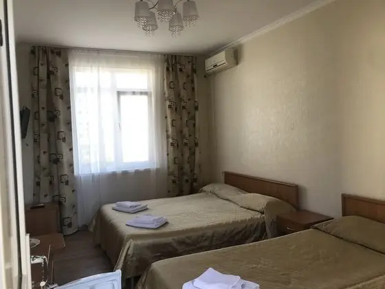 Standard Üç Kişilik Oda (Shared Balcony)