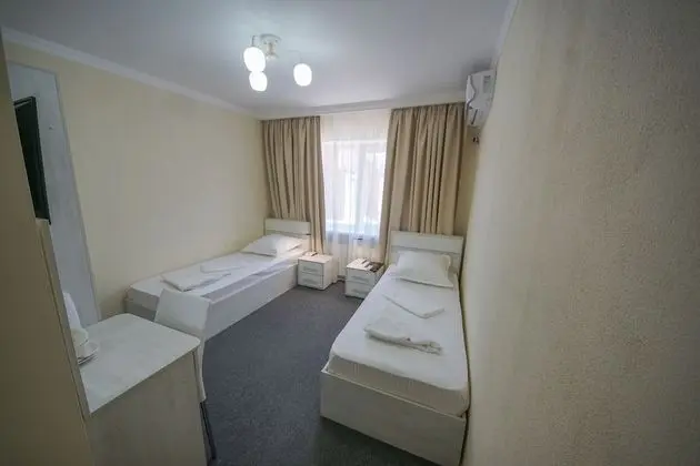 Comfort Tek Büyük veya İki Ayrı Yataklı Oda