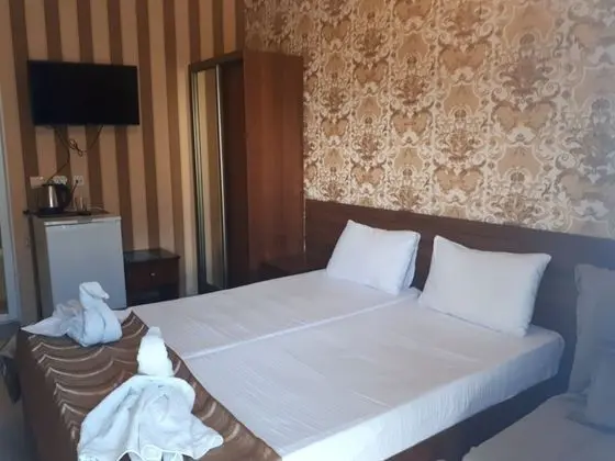 Deluxe Üç Kişilik Oda