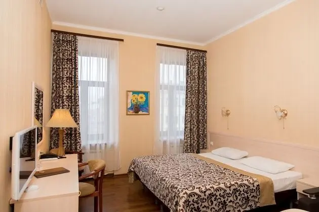 Deluxe Tek Büyük veya İki Ayrı Yataklı Oda