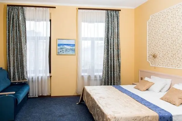 Deluxe Tek Büyük veya İki Ayrı Yataklı Oda