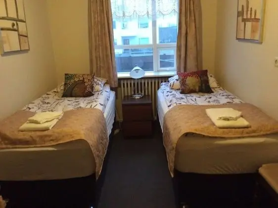 Basic Tek Büyük veya İki Ayrı Yataklı Oda, Ortak Banyo