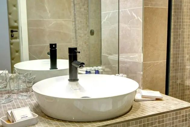 Deluxe Tek Büyük veya İki Ayrı Yataklı Oda