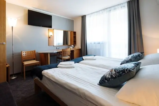 Deluxe Tek Büyük veya İki Ayrı Yataklı Oda