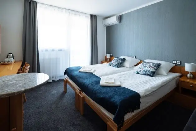 Deluxe Tek Büyük veya İki Ayrı Yataklı Oda