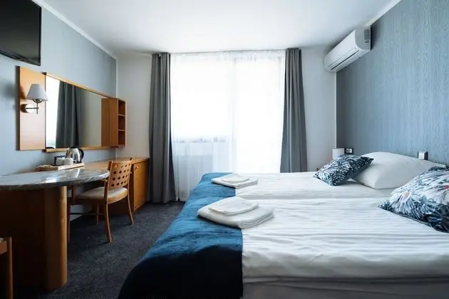 Deluxe Tek Büyük veya İki Ayrı Yataklı Oda
