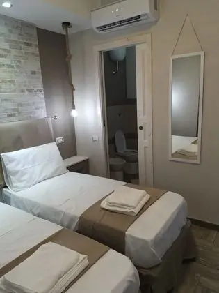 Deluxe Tek Büyük veya İki Ayrı Yataklı Oda