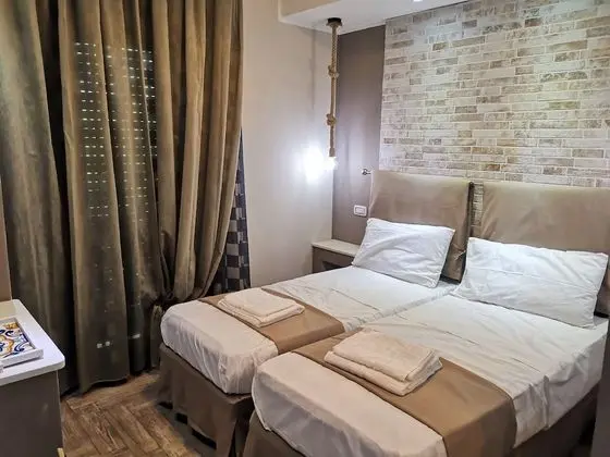 Deluxe Tek Büyük veya İki Ayrı Yataklı Oda