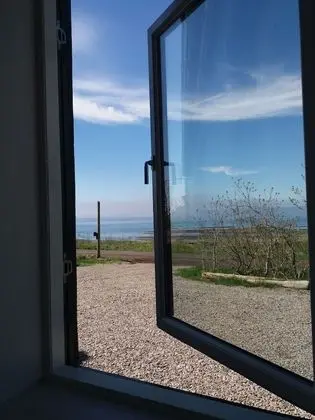 Basic Tek Büyük veya İki Ayrı Yataklı Oda, Özel Banyo, Okyanus Manzaralı (Shared Kitchen)