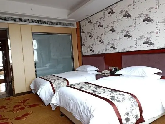 Deluxe Tek Büyük veya İki Ayrı Yataklı Oda