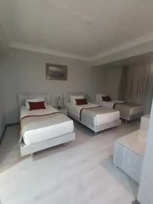 Üç Kişilik Oda, Bahçe Manzaralı