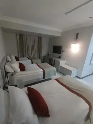 Üç Kişilik Oda, Bahçe Manzaralı