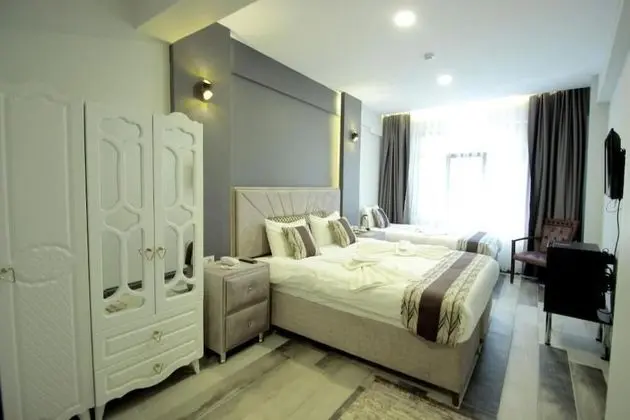 Deluxe Üç Kişilik Oda, Birden Çok Yatak, Sigara İçilmez, Şehir Manzaralı
