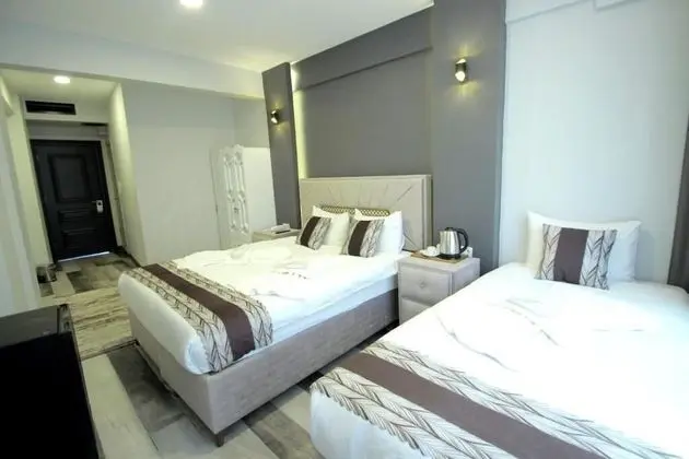 Deluxe Üç Kişilik Oda, Birden Çok Yatak, Sigara İçilmez, Şehir Manzaralı