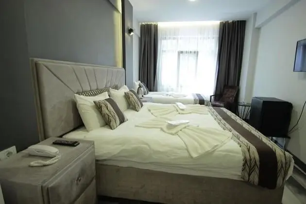 Deluxe Üç Kişilik Oda, Birden Çok Yatak, Sigara İçilmez, Şehir Manzaralı