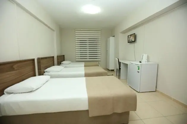 Üç Kişilik Oda