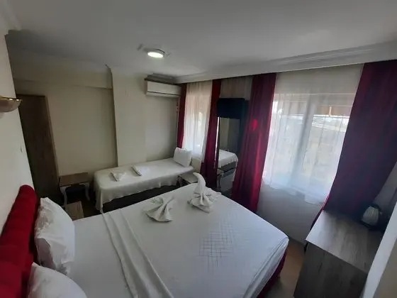Üç Kişilik Oda